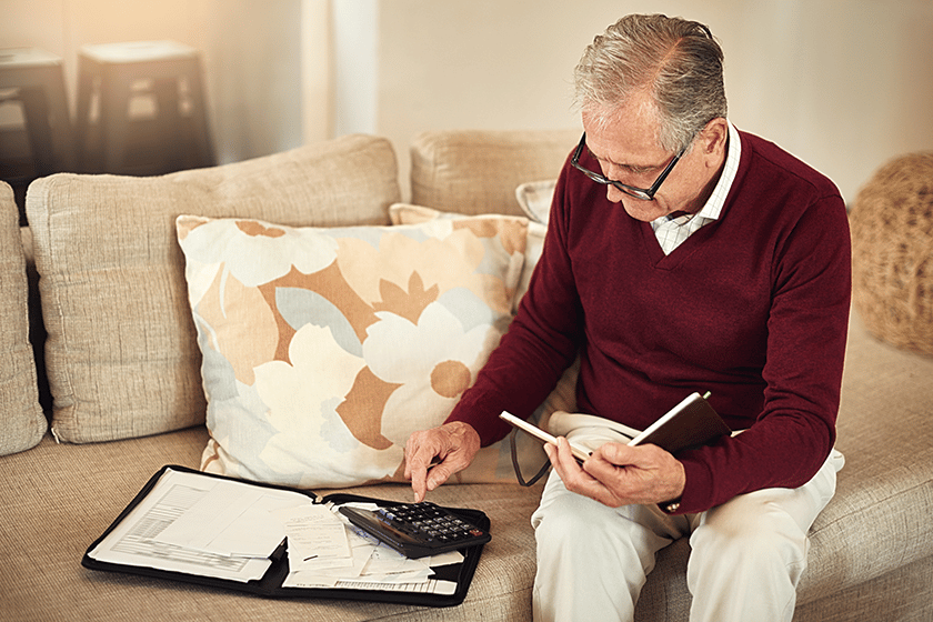 Senior man budgeting
